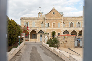 Fototapeta na wymiar The Piligrim Residence building on the Milk Grotto Street near the Church of Nativity in Bethlehem in the Palestinian Authority, Israel
