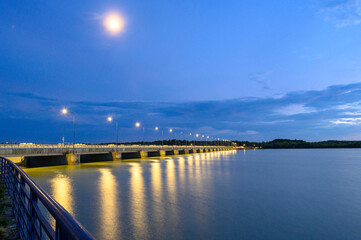 Fototapeta na wymiar Cunovo hydroelectric plant in evening blue light