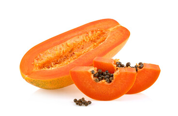 whole and half ripe papaya isolated on white background