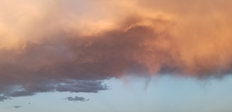 Fiery Mountain Sunset with Orange Clouds from Denver Colorado 