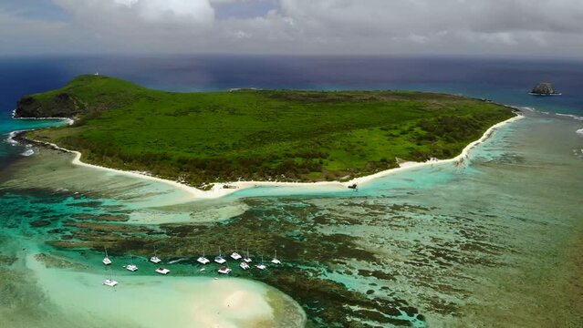 Aerial view on a bay with catamarans between Flat and Gabriel islands 