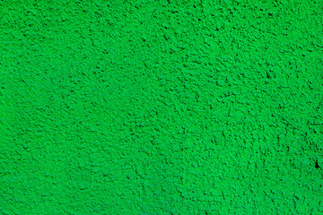 Close-up, texture of a green facade made of decorative plaster.
