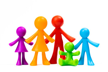 Figurines of the family stand on white isolated background. Concept of classic traditional family, values, unity and loyalty, strong and healthy. Society, procreation photo