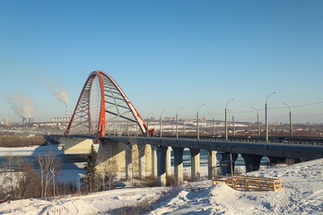 The large red arch bridge in winter close-up