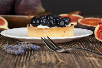 tartlet with cream and blueberries