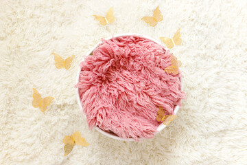Newborn photography digital background prop. Basket with fur and butterflies on a white background.