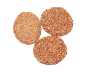 Raw burger cutlets isolated on white background. Three breaded beef patties. Top view.