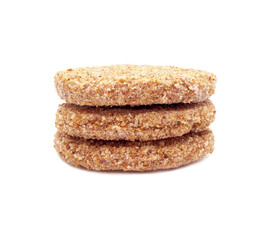 Raw burger cutlets isolated on white background. Three breaded beef patties. Side view.