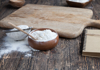 wheat flour in a wooden bowl