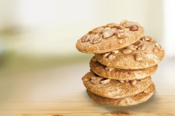 Peanut butter cookies stack on wooden board. Traditional american dessert, nutrition snack, dessert or breakfast food.