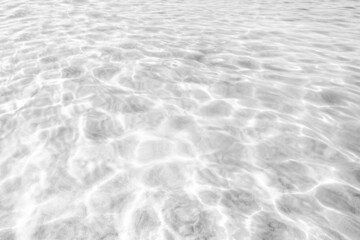 View on ocean water with ripples and flecks
