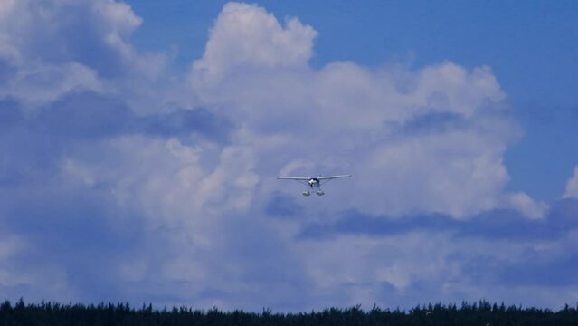 Slow motion view of a float plane landing near Le Morne in Mauritius
