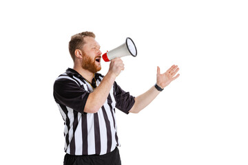One young bearded man, soccer or football referee shouting at megaphone isolated on white studio...
