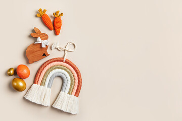 Easter decorations with bunny, carrot, rainbow,  Easter colored eggs and candy. Happy Easter concept.