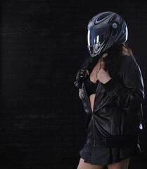 portrait of sexy old woman in biker helmet