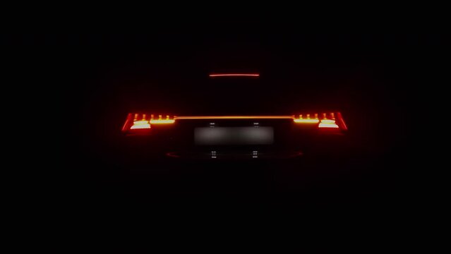 Close up of red headlight turning on, back automotive car optics e-tron, e tron GT.  Black background 4k