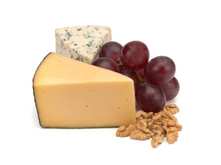 cheese, nuts, grapes on white background, close up