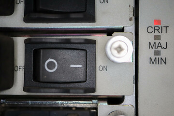 close up of an on/off switch on the router