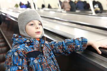 Child on escalator in St. Petersburg metro