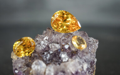 Natural Sapphire gemstone, Jewel or gems on black shine color, natural yellow gemstones on stone