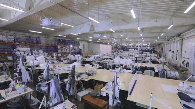 An empty sewing workshop. Panorama of a large sewing workshop. Large sewing production