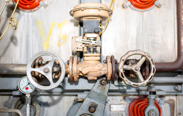 The valve on the factory equipment. Industrial compressors and industrial apparatus. Factory...