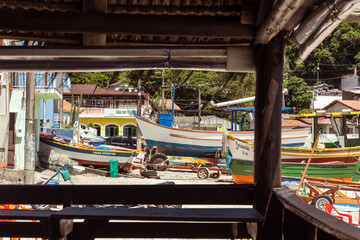 Fototapeta na wymiar Fisher boats in Pantano do Sul, Florianopolis, Brazil.