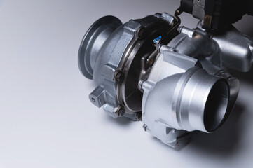 New car turbine on a white background. close-up. Car parts copy space