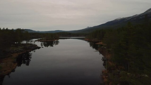 Flying Low Over Lake Holmevatn Mountain Forest Norway 4K 30fps