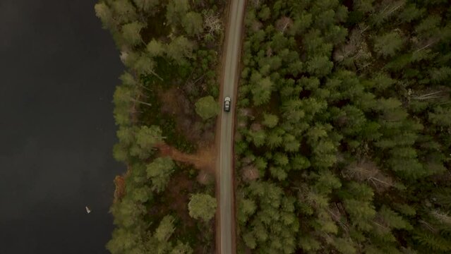 Landrover from above follow on dirtroad 4K Warm Tones Forest Norway 30fps