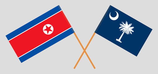 Crossed flags of North Korea and The State of South Carolina. Official colors. Correct proportion