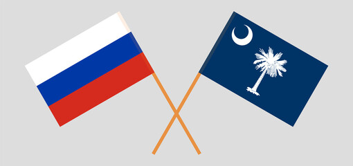 Crossed flags of Russia and The State of South Carolina. Official colors. Correct proportion
