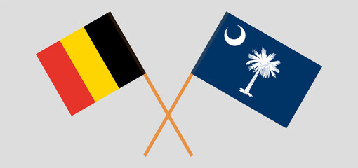 Crossed flags of Belgium and The State of South Carolina. Official colors. Correct proportion