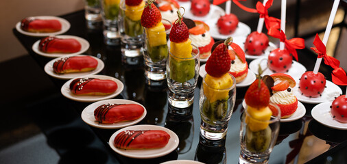 Candy bar. Table with sweets, candies, dessert