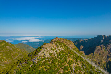 Aerial view of the peak of the Pico Ruivo - highest mountain in Madeira islands in the evening