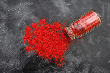 Spice paprika on the kitchen table, top view