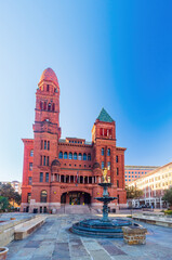 Sunny view of Courthouse building and Lady of Justice statue