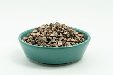 Sweet buckwheat seeds on a monochrome background