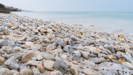 Beautiful Jebel Fuwairit Beach with pebbles in Qatar.