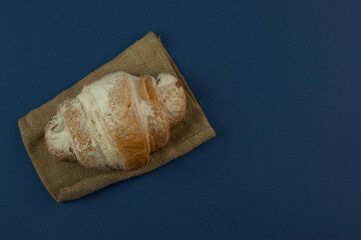 croissant on color background fresh bakery sweet dessert bun snack healthy meal copy space for text food background rustic image