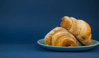 croissant on color background fresh bakery sweet dessert bun snack healthy meal copy space for text food background rustic image