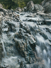 A mountain stream among the rocks of the Bieszczady Mountains