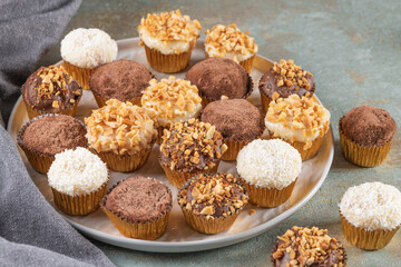 Brigadeiro is a common Brazilian dessert. Delicious chocolate candy Brigadeiro on a table