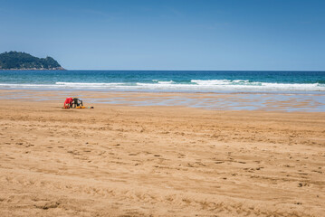 Fototapeta na wymiar Lifeguards seats on the beach near the ocean