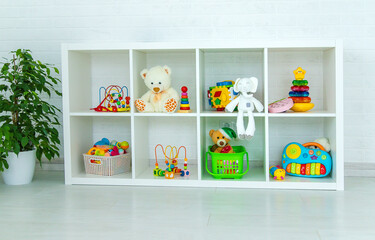 Light children's room with toys. Selective focus.