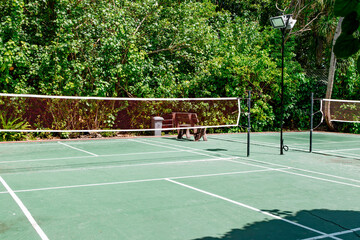 empty tennis court on a tropical island in the Maldives