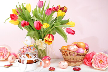 Festive easter banner,spring composition with decorated homemade eggs and blooming flowers,creative...