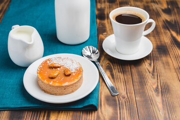 Cake with coffee and cream.