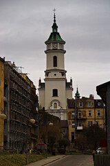 Ostrowiec Świętokrzyski. Uliczka rodzinnego miasta ze starą zabudową. Zabytkowe kamienice, kościół ( Dom Boży ). A lane of his hometown with old buildings. Historic church houses (House of God). 