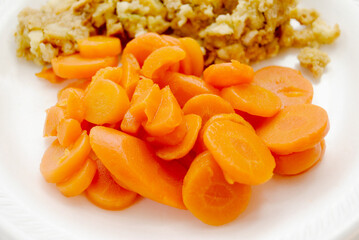 Healthy Sliced Orange Carrots as a Side Dish 	